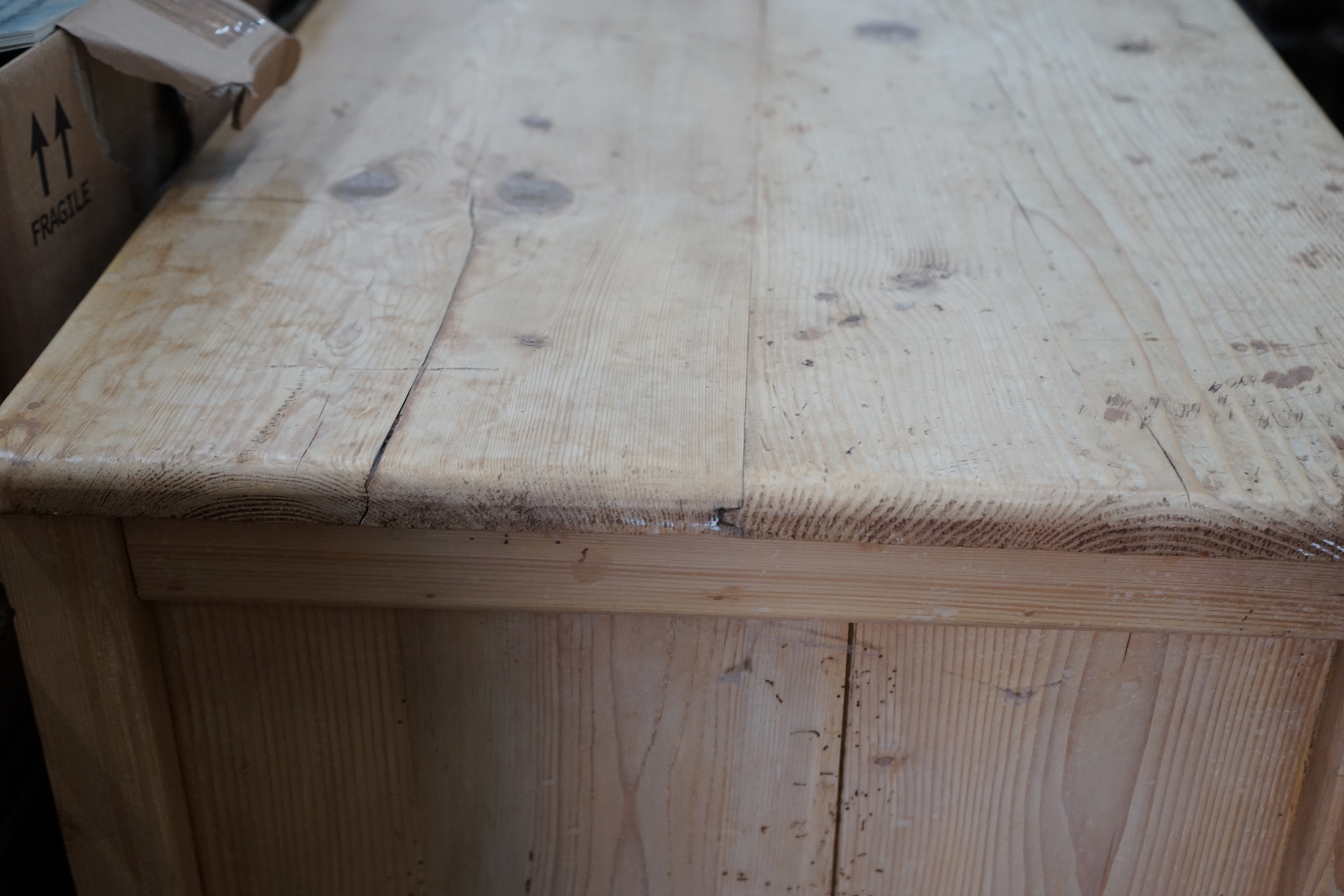 A 19th century pine two drawer side cabinet, width 124cm depth 63cm height 100cm